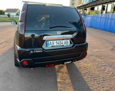 Чорний Ніссан ІксТрейл, об'ємом двигуна 2.5 л та пробігом 223 тис. км за 9172 $, фото 3 на Automoto.ua