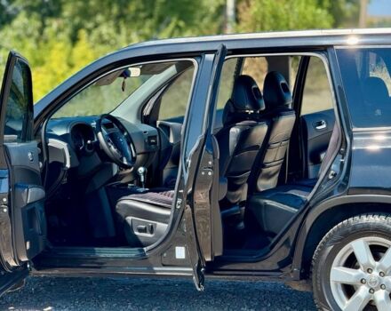 Черный Ниссан ИксТрейл, объемом двигателя 2.5 л и пробегом 170 тыс. км за 8500 $, фото 7 на Automoto.ua