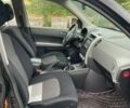 Черный Ниссан ИксТрейл, объемом двигателя 2 л и пробегом 250 тыс. км за 9800 $, фото 8 на Automoto.ua