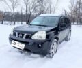 Черный Ниссан ИксТрейл, объемом двигателя 2.5 л и пробегом 180 тыс. км за 9500 $, фото 1 на Automoto.ua