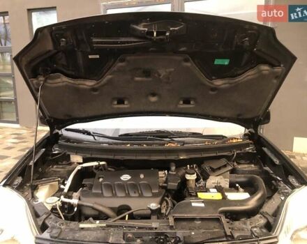 Чорний Ніссан ІксТрейл, об'ємом двигуна 2 л та пробігом 223 тис. км за 8999 $, фото 6 на Automoto.ua