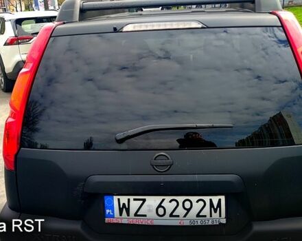 Черный Ниссан ИксТрейл, объемом двигателя 2 л и пробегом 331 тыс. км за 4200 $, фото 1 на Automoto.ua