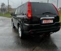 Чорний Ніссан ІксТрейл, об'ємом двигуна 2 л та пробігом 240 тис. км за 6500 $, фото 4 на Automoto.ua