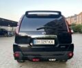 Черный Ниссан ИксТрейл, объемом двигателя 2.49 л и пробегом 157 тыс. км за 14500 $, фото 4 на Automoto.ua