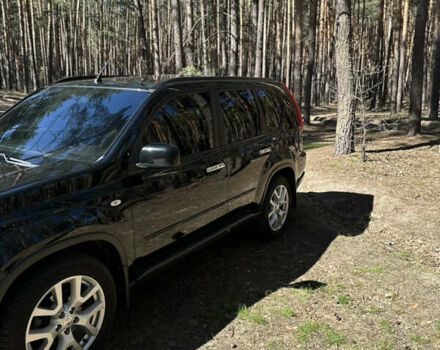 Черный Ниссан ИксТрейл, объемом двигателя 2 л и пробегом 226 тыс. км за 13000 $, фото 1 на Automoto.ua