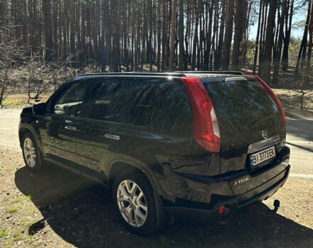 Черный Ниссан ИксТрейл, объемом двигателя 2 л и пробегом 226 тыс. км за 13000 $, фото 3 на Automoto.ua