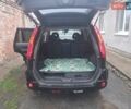 Черный Ниссан ИксТрейл, объемом двигателя 2 л и пробегом 256 тыс. км за 9700 $, фото 2 на Automoto.ua