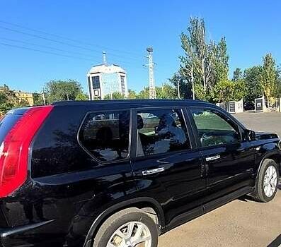 Чорний Ніссан ІксТрейл, об'ємом двигуна 2 л та пробігом 325 тис. км за 13500 $, фото 4 на Automoto.ua