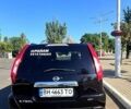 Чорний Ніссан ІксТрейл, об'ємом двигуна 2 л та пробігом 325 тис. км за 13500 $, фото 6 на Automoto.ua