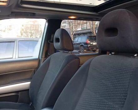 Черный Ниссан ИксТрейл, объемом двигателя 2 л и пробегом 238 тыс. км за 10500 $, фото 5 на Automoto.ua