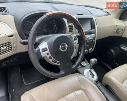 Черный Ниссан ИксТрейл, объемом двигателя 2.5 л и пробегом 350 тыс. км за 6300 $, фото 3 на Automoto.ua