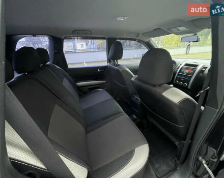 Черный Ниссан ИксТрейл, объемом двигателя 2 л и пробегом 169 тыс. км за 10900 $, фото 24 на Automoto.ua