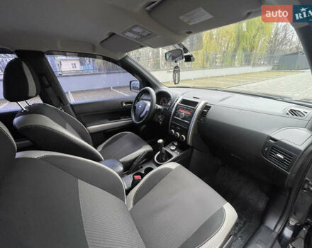 Черный Ниссан ИксТрейл, объемом двигателя 2 л и пробегом 169 тыс. км за 10900 $, фото 22 на Automoto.ua