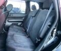 Чорний Ніссан ІксТрейл, об'ємом двигуна 2.4 л та пробігом 252 тис. км за 9990 $, фото 8 на Automoto.ua
