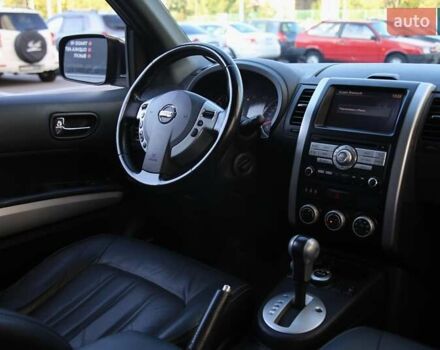Черный Ниссан ИксТрейл, объемом двигателя 2 л и пробегом 213 тыс. км за 11999 $, фото 10 на Automoto.ua