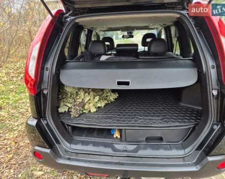 Чорний Ніссан ІксТрейл, об'ємом двигуна 2 л та пробігом 226 тис. км за 12300 $, фото 9 на Automoto.ua