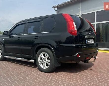 Черный Ниссан ИксТрейл, объемом двигателя 2 л и пробегом 169 тыс. км за 10500 $, фото 4 на Automoto.ua