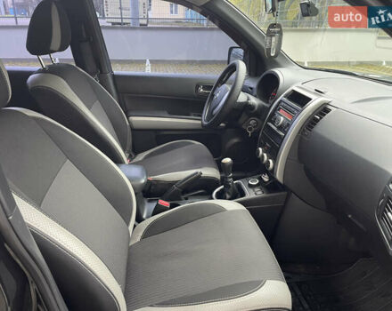 Черный Ниссан ИксТрейл, объемом двигателя 2 л и пробегом 169 тыс. км за 10900 $, фото 21 на Automoto.ua