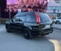 Чорний Ніссан ІксТрейл, об'ємом двигуна 2.4 л та пробігом 252 тис. км за 9990 $, фото 4 на Automoto.ua