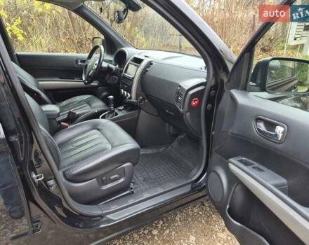 Чорний Ніссан ІксТрейл, об'ємом двигуна 2 л та пробігом 226 тис. км за 12300 $, фото 7 на Automoto.ua