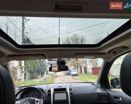 Чорний Ніссан ІксТрейл, об'ємом двигуна 2 л та пробігом 226 тис. км за 12300 $, фото 2 на Automoto.ua