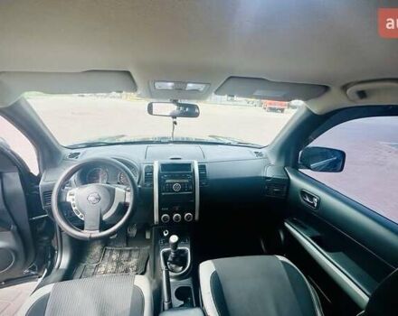 Черный Ниссан ИксТрейл, объемом двигателя 2 л и пробегом 169 тыс. км за 10500 $, фото 8 на Automoto.ua