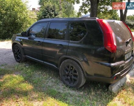 Черный Ниссан ИксТрейл, объемом двигателя 2.49 л и пробегом 343 тыс. км за 8500 $, фото 4 на Automoto.ua