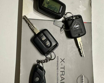 Черный Ниссан ИксТрейл, объемом двигателя 2 л и пробегом 183 тыс. км за 10500 $, фото 6 на Automoto.ua