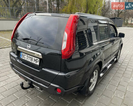 Черный Ниссан ИксТрейл, объемом двигателя 2 л и пробегом 169 тыс. км за 10900 $, фото 3 на Automoto.ua