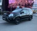 Чорний Ніссан ІксТрейл, об'ємом двигуна 2.4 л та пробігом 252 тис. км за 9990 $, фото 2 на Automoto.ua