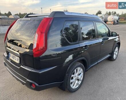 Черный Ниссан ИксТрейл, объемом двигателя 2 л и пробегом 260 тыс. км за 11500 $, фото 1 на Automoto.ua