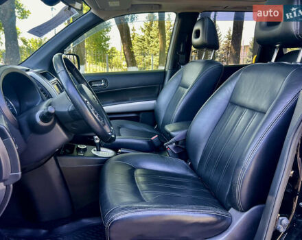 Черный Ниссан ИксТрейл, объемом двигателя 2 л и пробегом 125 тыс. км за 12300 $, фото 30 на Automoto.ua