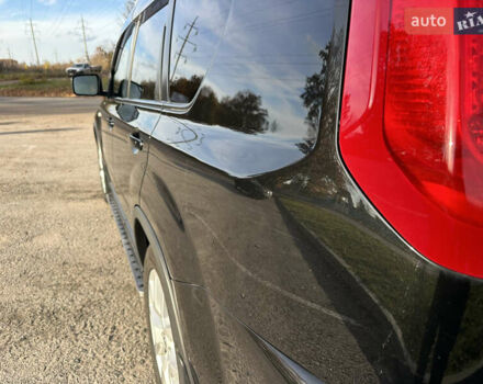 Чорний Ніссан ІксТрейл, об'ємом двигуна 2 л та пробігом 125 тис. км за 12999 $, фото 11 на Automoto.ua