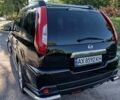 Черный Ниссан ИксТрейл, объемом двигателя 2 л и пробегом 125 тыс. км за 12999 $, фото 5 на Automoto.ua