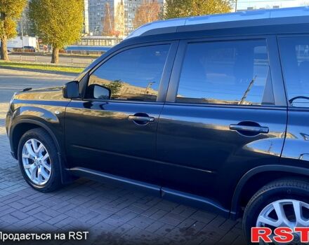 Черный Ниссан ИксТрейл, объемом двигателя 20 л и пробегом 185 тыс. км за 12200 $, фото 1 на Automoto.ua