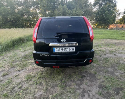 Черный Ниссан ИксТрейл, объемом двигателя 2 л и пробегом 90 тыс. км за 13000 $, фото 1 на Automoto.ua