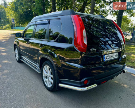 Черный Ниссан ИксТрейл, объемом двигателя 2 л и пробегом 125 тыс. км за 12300 $, фото 8 на Automoto.ua