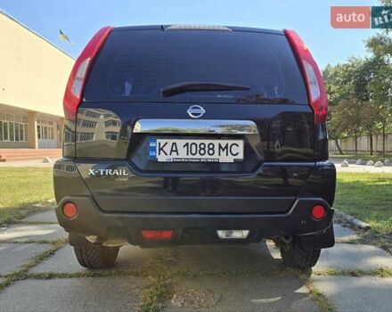 Чорний Ніссан ІксТрейл, об'ємом двигуна 2 л та пробігом 129 тис. км за 13000 $, фото 14 на Automoto.ua