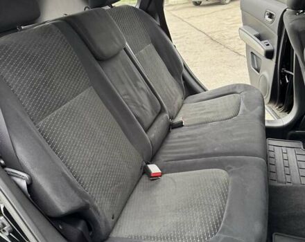 Черный Ниссан ИксТрейл, объемом двигателя 2 л и пробегом 11 тыс. км за 18500 $, фото 52 на Automoto.ua