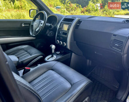 Черный Ниссан ИксТрейл, объемом двигателя 2 л и пробегом 125 тыс. км за 12300 $, фото 46 на Automoto.ua