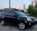 Черный Ниссан ИксТрейл, объемом двигателя 2.5 л и пробегом 150 тыс. км за 10999 $, фото 1 на Automoto.ua