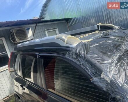 Черный Ниссан ИксТрейл, объемом двигателя 2 л и пробегом 170 тыс. км за 3900 $, фото 1 на Automoto.ua