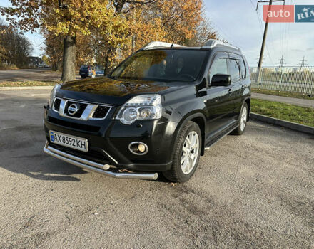 Чорний Ніссан ІксТрейл, об'ємом двигуна 2 л та пробігом 125 тис. км за 12999 $, фото 2 на Automoto.ua