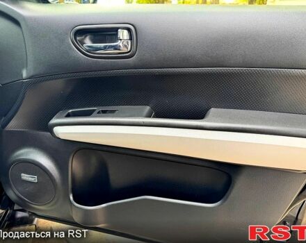 Черный Ниссан ИксТрейл, объемом двигателя 2.5 л и пробегом 159 тыс. км за 11780 $, фото 12 на Automoto.ua