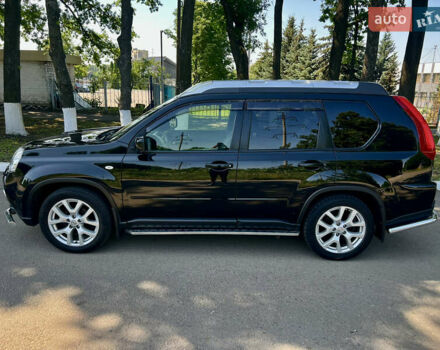 Черный Ниссан ИксТрейл, объемом двигателя 2 л и пробегом 125 тыс. км за 12300 $, фото 7 на Automoto.ua