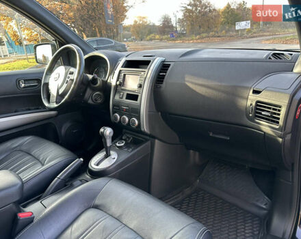 Чорний Ніссан ІксТрейл, об'ємом двигуна 2 л та пробігом 125 тис. км за 12999 $, фото 23 на Automoto.ua