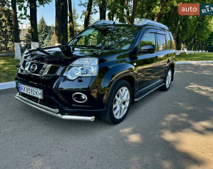 Черный Ниссан ИксТрейл, объемом двигателя 2 л и пробегом 125 тыс. км за 12300 $, фото 4 на Automoto.ua