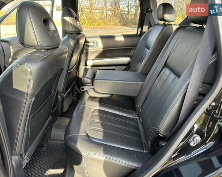 Чорний Ніссан ІксТрейл, об'ємом двигуна 2 л та пробігом 125 тис. км за 12999 $, фото 17 на Automoto.ua