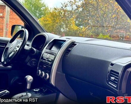 Черный Ниссан ИксТрейл, объемом двигателя 2.5 л и пробегом 159 тыс. км за 11780 $, фото 6 на Automoto.ua