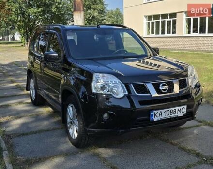 Чорний Ніссан ІксТрейл, об'ємом двигуна 2 л та пробігом 129 тис. км за 13000 $, фото 5 на Automoto.ua